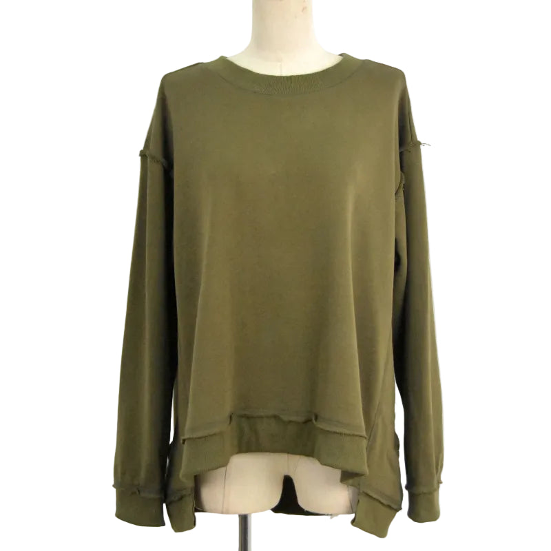 An olive green long-sleeve top with a high-low hem and raw, distressed edges, displayed on a mannequin torso against a white background.