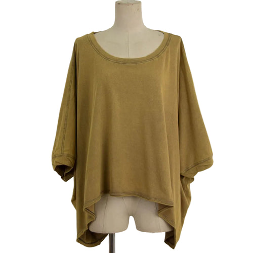 A loose, oversized short-sleeve top in a muted mustard or ochre yellow color, displayed on a beige mannequin torso against a plain light gray background.
