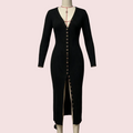 A black ribbed long-sleeve midi dress with a deep V-neck, front button closure, and front slit, displayed on a mannequin against a plain light gray wall.
