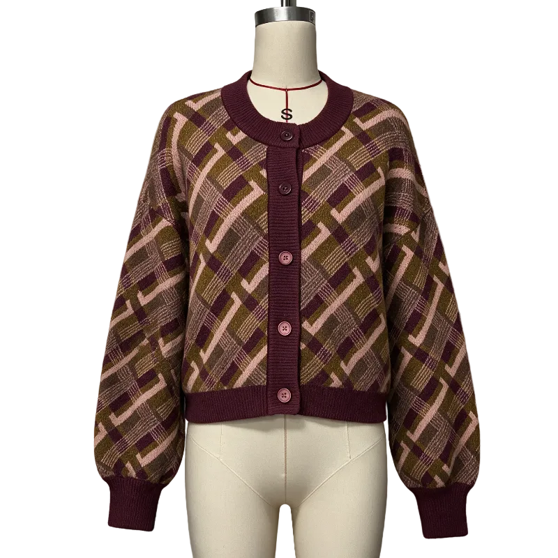 A cropped cardigan sweater displayed on a cream mannequin torso. The cardigan features a geometric plaid pattern in olive green, burgundy, and light pink, with solid burgundy ribbed trim on the collar, cuffs, and hem, and matching burgundy buttons down the center front.