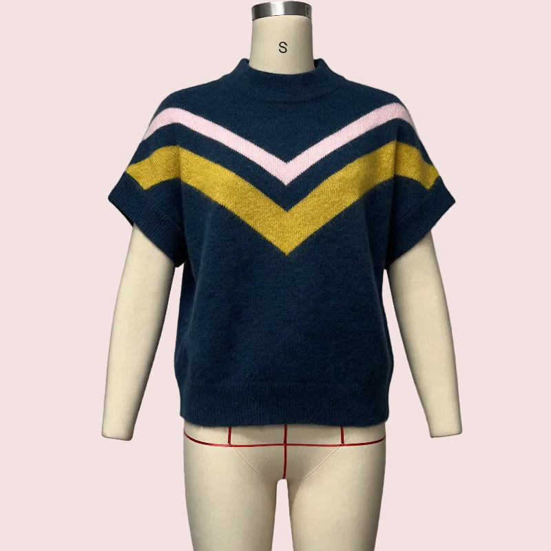 A short-sleeve knit sweater displayed on a cream mannequin torso against a pale pink background. The sweater is navy blue with a large mustard yellow V-stripe across the chest and a thinner light pink V-stripe above it.