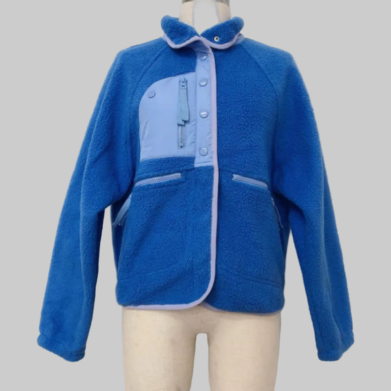 Blue fleece jacket on a mannequin against a white background